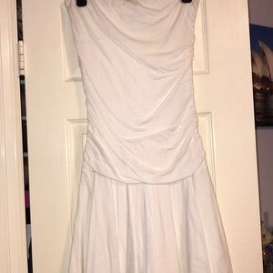 White knit dress with ruching down the sides